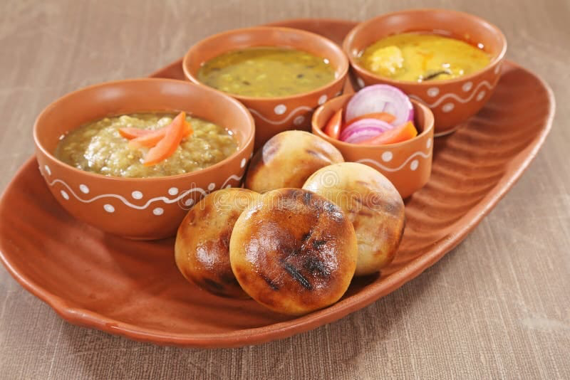 Authentic Litti Chokha platter served on traditional clay